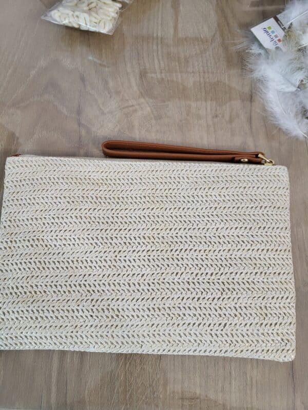 Pochette plumes et coquillages