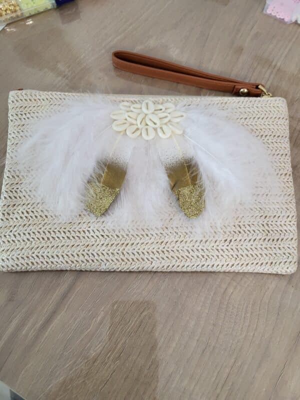 Pochette plumes et coquillages