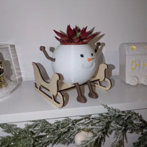 Pot à fleur bonhomme de neige sur son traineau